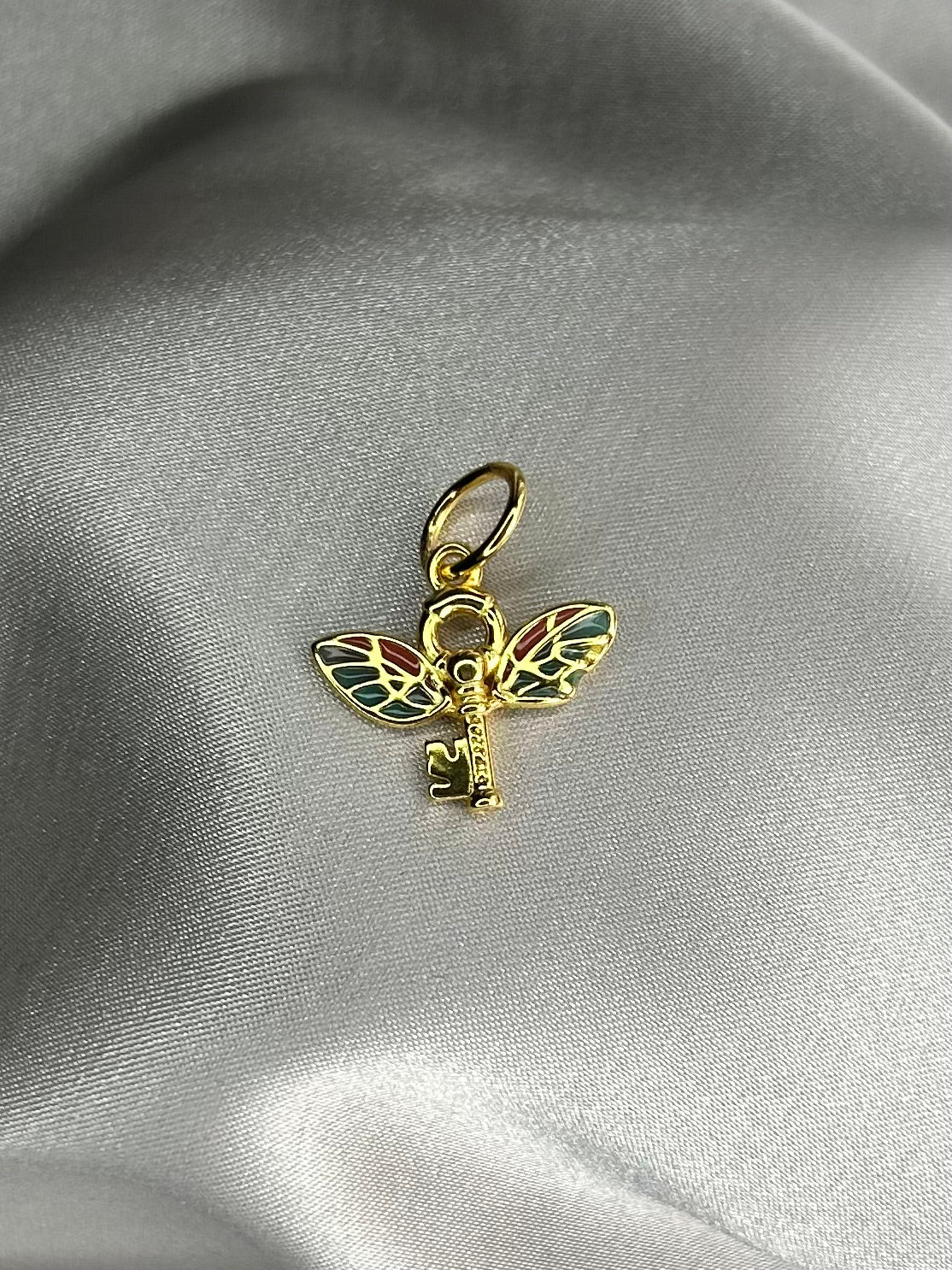 Charm HP Llave Voladora