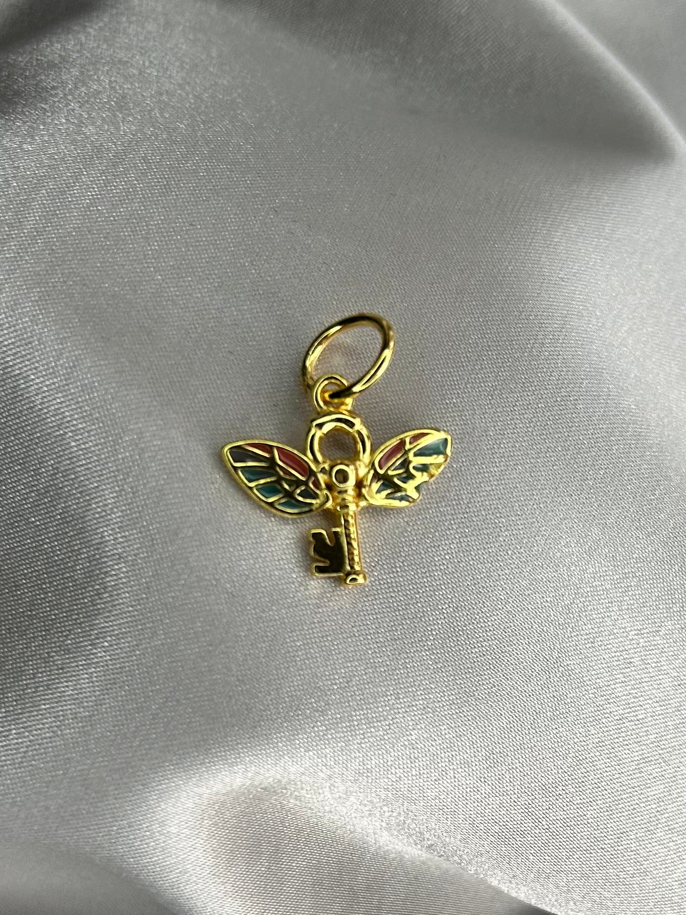 Charm HP Llave Voladora